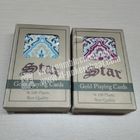 Sur les cartes de jeu invisibles en plastique d'or de The Star pour l'analyseur de tisonnier